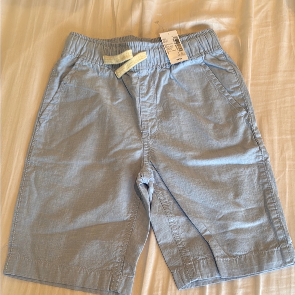 Light Blue Shorts with elastic waistband, functional drawstring.  Size 8 NWT